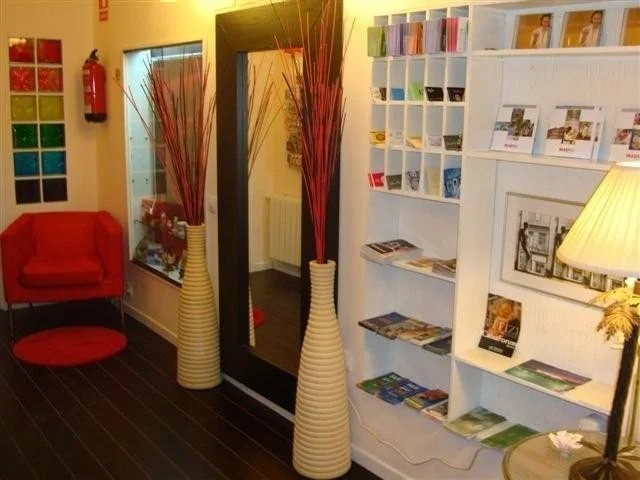Contemporary colorful lobby with dark wooden flooring